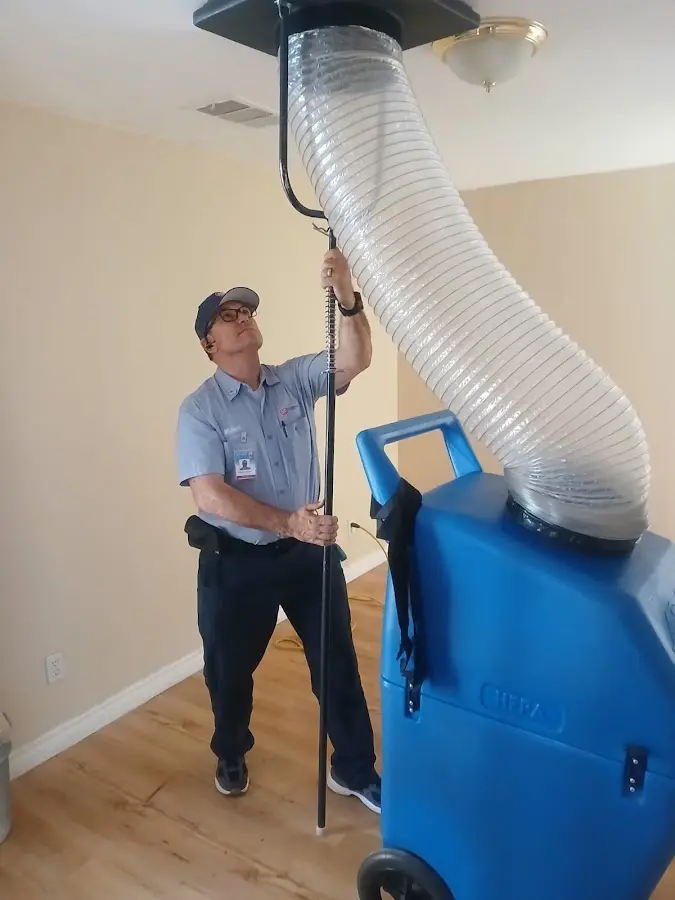 Mini Split Installation technician using HEPA equipment in Mineola
